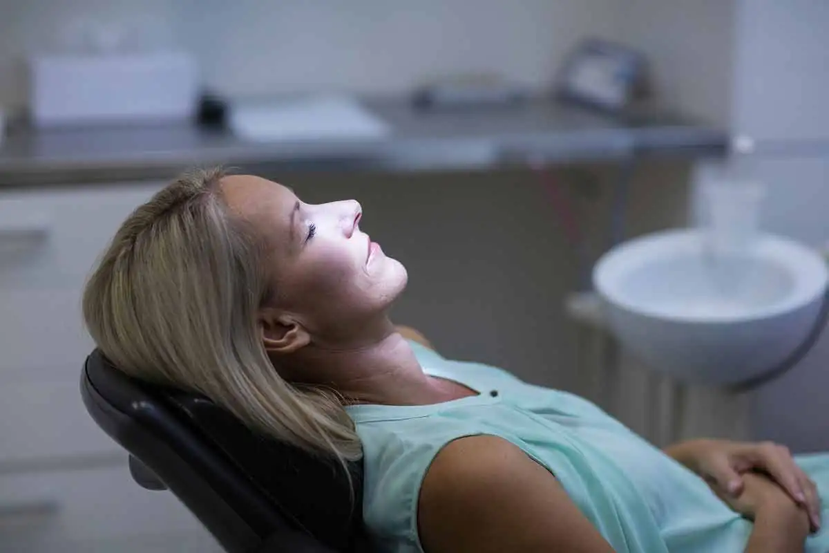 woman receiving treatment at Brodine Prosthodontics in Rochester, NY