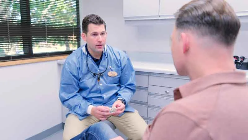 Dr. Brian Brodine discussing dental implant options